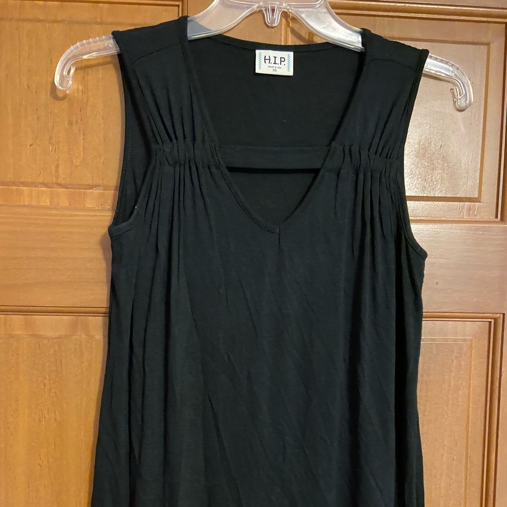Sleeveless black blouse